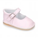 Baby Nappa leather Mary Jane shoes with buckle fastening and flexible soles .