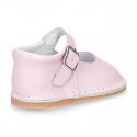 Baby Nappa leather Mary Jane shoes with buckle fastening and flexible soles .