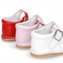 Baby Nappa leather Mary Jane shoes with buckle fastening and flexible soles .