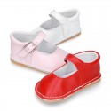 Baby Nappa leather Mary Jane shoes with buckle fastening and flexible soles .