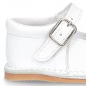 Baby Nappa leather Mary Jane shoes with buckle fastening and flexible soles .