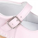 Baby Nappa leather Mary Jane shoes with buckle fastening and flexible soles .