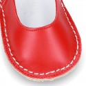 Baby Nappa leather Mary Jane shoes with buckle fastening and flexible soles .