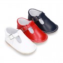 Baby Nappa leather T-bar shoes with buckle fastening and flexible soles .