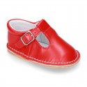 Baby Nappa leather T-bar shoes with buckle fastening and flexible soles .