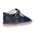 Baby Nappa leather T-bar shoes with buckle fastening and flexible soles .