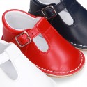 Baby Nappa leather T-bar shoes with buckle fastening and flexible soles .