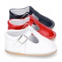 Baby Nappa leather T-bar shoes with buckle fastening and flexible soles .