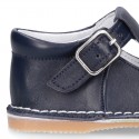 Baby Nappa leather T-bar shoes with buckle fastening and flexible soles .