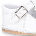 Baby Nappa leather T-bar shoes with buckle fastening and flexible soles .