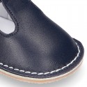 Baby Nappa leather T-bar shoes with buckle fastening and flexible soles .