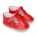 Baby Nappa leather T-bar shoes with buckle fastening and flexible soles .