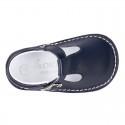 Baby Nappa leather T-bar shoes with buckle fastening and flexible soles .