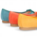 Soft Suede leather ballet flats with adjustable ribbon.