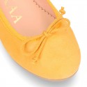 Soft Suede leather ballet flats with adjustable ribbon.