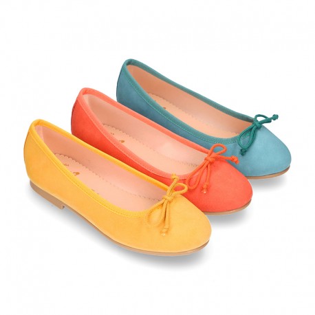 Soft Suede leather ballet flats with adjustable ribbon.