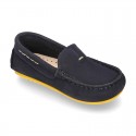 Nobuck leather Moccasin shoes for little kids with contrast driver type soles.