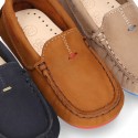 Nobuck leather Moccasin shoes for little kids with contrast driver type soles.