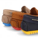 Nobuck leather Moccasin shoes for little kids with contrast driver type soles.