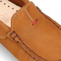 Nobuck leather Moccasin shoes for little kids with contrast driver type soles.
