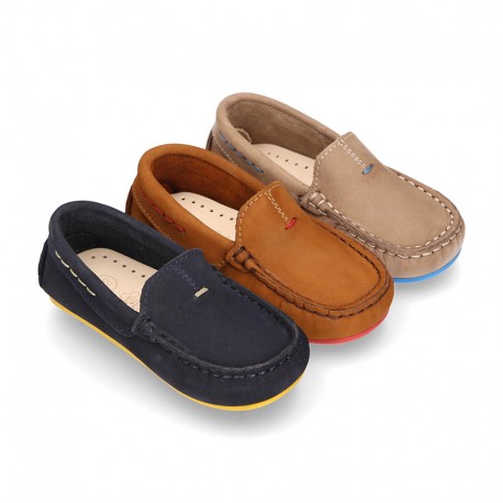 Nobuck leather Moccasin shoes for little kids with contrast driver type soles.