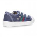 Cotton canvas sneakers with zipper and ties closure and toe cap.