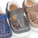 Combined T-Strap sandal shoes with hook and loop strap, toe cap and counter.