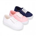 RECYCLED COTTON canvas tennis shoes to dress for kids with shoelaces closure.