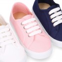 RECYCLED COTTON canvas tennis shoes to dress for kids with shoelaces closure.