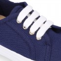 RECYCLED COTTON canvas tennis shoes to dress for kids with shoelaces closure.