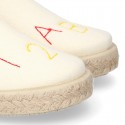 Cotton canvas kids SLIP ON Espadrille shoes with numbers and letters design and with elastic bands.