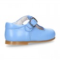 Classic Nappa leather T-strap shoes with buckle fastening.