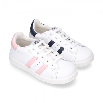 Washable leather school tennis shoes with shoelaces and stripes design.