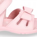 Washable leather sandals with big bow and hook and loop strap for little girls.