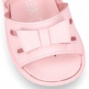 Washable leather sandals with big bow and hook and loop strap for little girls.