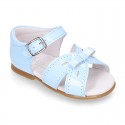 New patent leather sandals with ribbon for little girls.