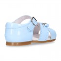 New patent leather sandals with ribbon for little girls.