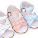 New patent leather sandals with ribbon for little girls.