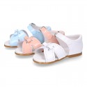 New patent leather sandals with ribbon for little girls.