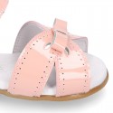 New patent leather sandals with ribbon for little girls.