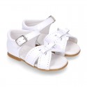 New patent leather sandals with ribbon for little girls.