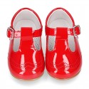 Classic T-strap shoes in RED patent leather.