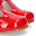 Classic T-strap shoes in RED patent leather.