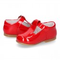 Classic T-strap shoes in RED patent leather.