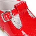 Classic T-strap shoes in RED patent leather.