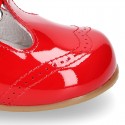 Classic T-strap shoes in RED patent leather.