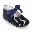 Patent leather little Mary Jane shoes with ties closure for babies.