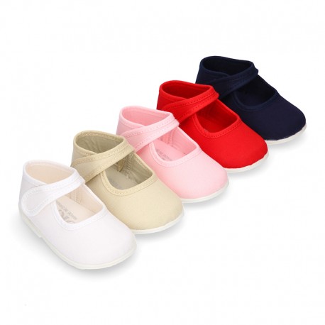 Cotton canvas little Mary Jane shoes with hook and loop closure for babies.