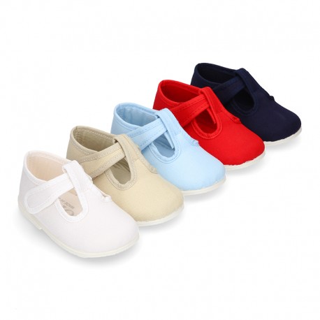 Cotton canvas little T-Strap shoes with hook and loop closure for babies.