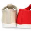 Cotton canvas little T-Strap shoes with hook and loop closure for babies.